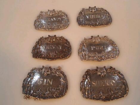 A set of six silver decanter labels by C J Vander Ltd