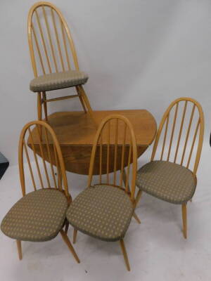 An Ercol light elm oval drop leaf kitchen table, on square tapering legs, and four matching chairs, 110cm W. - 2