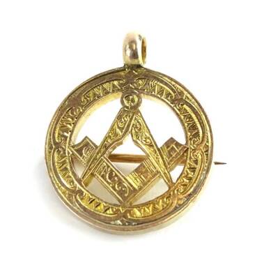 A 9ct gold Masonic pendant/brooch, of circular form with Masonic emblem to centre, with makers stamp WJD to rear, Birmingham assay, 2cm W, 5.8g all in.