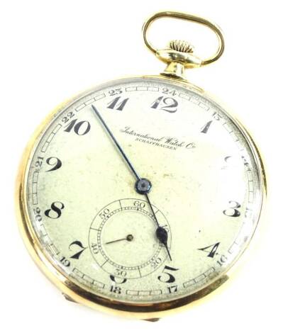 An International Watch Company pocket watch, in a yellow metal case, stamped 14k, and numbered 921104, with worn silver coloured dial, blue hands seconds dial and marked Schaffhausen, bezel wind, 4.5cm W, 59.3g all in.