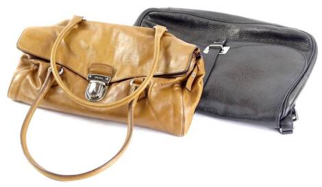 A Prada Vitello Easy shoulder bag, in tan leather, 17cm H, 33cm W, 10cm D, and a black Prada pebbled leather shoulder bag, 26cm H, 36cm W, 10cm D, (2).