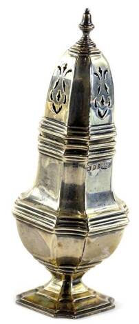 A late Victorian silver sugar castor, with moulded bands, canted corners and an acorn shaped finial with tapering foot, London 1898, 3¾oz, 14cm H.