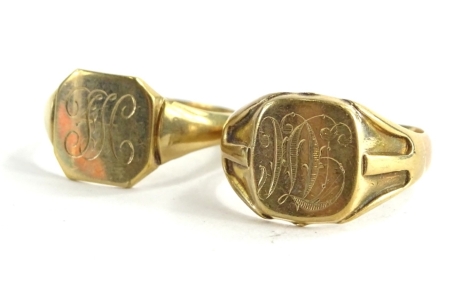 Two 9ct gold signet rings, one bearing the initials TM, with pierced design shoulders, ring size T½, the other bearing the initials FH, ring size W, 9.8g.