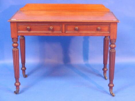 A William IV mahogany side table or wash stand with low gallery back and