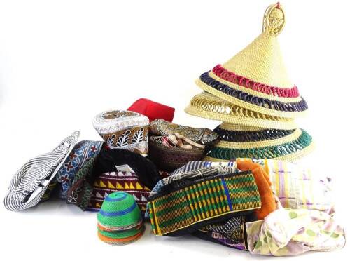 Various hats from around the world, to include Far East, Middle Eastern, etc.