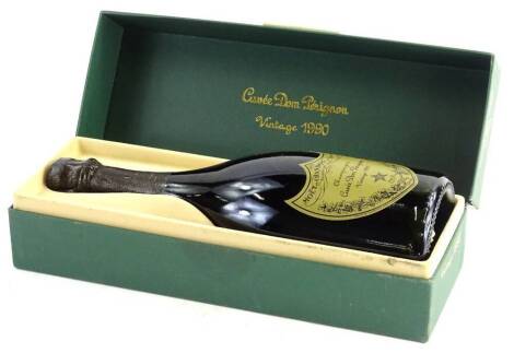 A bottle of Dom Perignon 1990 vintage champagne, in presentation box.