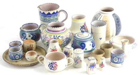 Various items of Poole pottery, mainly hand decorated in the traditional Poole style, some pieces with monograms, etc.