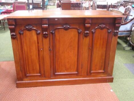 A Victorian figured mahogany side cabinet