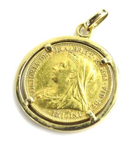 A full gold sovereign pendant, dated 1895, in a 18ct gold frame, stamped 750, 11g all in.