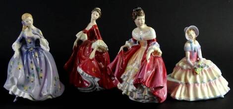 Four various Royal Doulton figures, comprising Southern Belle, HN229, 21cm H, Day Dreams, Nicola and Stephanie, printed marks beneath. (4)