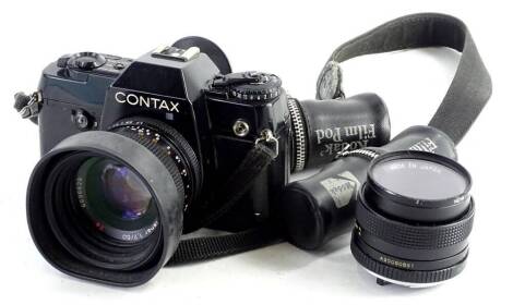 A Contax camera, with Plana 1.7/50 Carl Zeiss lens, number 6696629, 10cm H, with a further Yashica lens ML50mm 1:1.7.