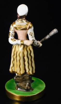 A Chamberlain Worcester figure of Madame Vestry with her broom, the figure standing on a circular base wearing a yellow ground skirt and pink bodice with fine gilding, c1830, 14cm H. - 2