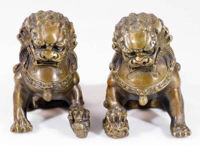 A pair of 20thC classical mystical dog of fo figures, standing on four paws, 15cm H. (2) - 2