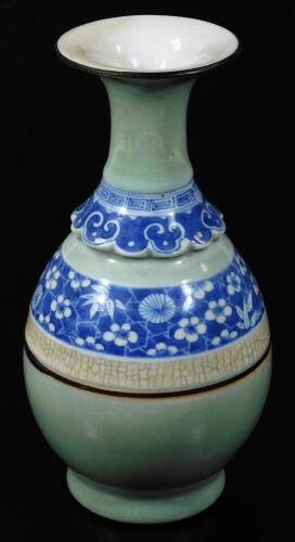 A 19thC Chinese porcelain celadon vase, with blue highlights, trumpet stem, bulbous body and a decorative banding, on a circular foot, unmarked, 24cm H.