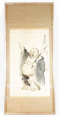 Chinese School. Figure of Buddha standing holding bamboo and pointing, mixed media wash on a silk and material ground, with floral highlights, signed, 163cm x 64cm. - 2