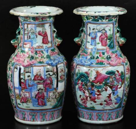 A pair of 19thC Chinese Cantonese famille rose baluster vases, decorated with figures at war and classical figures, on a floral ground, 36cm H. (2)