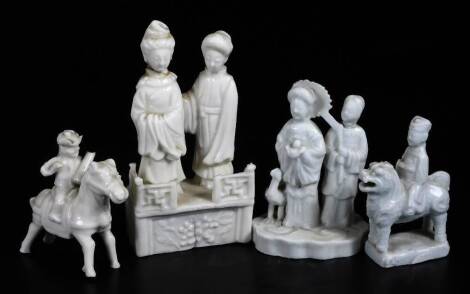 Four 19thC blanc de chine porcelain Chinese figures. (various dimensions, 4)