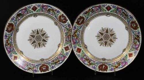 09/01/20 Take back to LN for collection. vendor paid £12 fees at GR debit card. A pair of Sevres porcelain Chateau De Fontainbleau plates, of circular form with armorial crests, centred with a pierced gilt star and scroll pattern with a square border poly