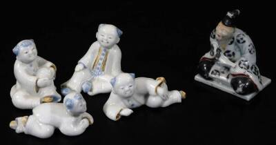 Various Chinese porcelain figures, to include a sage in flowing robes in seated position, 5cm H, various other figures, etc. sparsely decorated. (5)