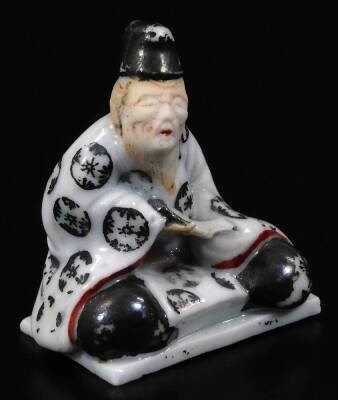 Various Chinese porcelain figures, to include a sage in flowing robes in seated position, 5cm H, various other figures, etc. sparsely decorated. (5) - 2