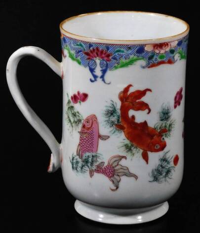 A Chinese export porcelain tankard, the bell shaped body decorated with fish, with an upper floral banding, polychrome decorated predominately in orange, pink and green, with half capped handle, on circular foot, 16cm H.