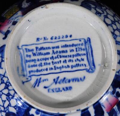 A 19thC Adams commemorative Chinese pottery bowl, polychrome decorated predominately in blue, yellow and green, printed marks beneath, 13cm Dia. a Chinese jar and cover and a signed dish. (3) - 5