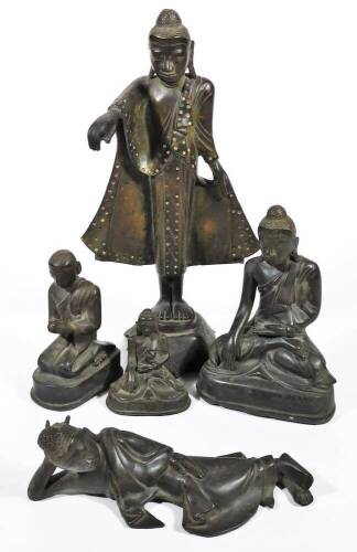 Various oriental bronze and bronzed figures, other metalware etc. comprising three various gods or figures praying, two with legs crossed, 19cm H, etc. a recumbent lady and a figure of a lady standing with arm outstretched. (5)