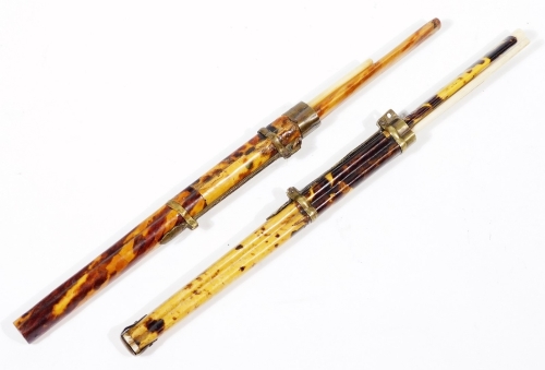 A pair of early 20thC chopstick sets, each in tortoiseshell decorated bamboo style sheaths, 29cm W. (2)