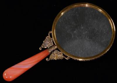 An Eastern style hand mirror, with circular glass and shaped handle, set with polished stones to the back, with an elaborate central section, 22cm H. (boxed) - 3