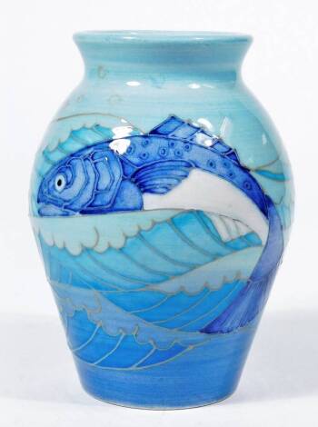 A Dennis China Works fish vase, decorated in blue glazes with fish, marked Dennis China Works S.T des TRIAL. 99, 13cm H.