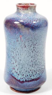 A 20thC Moorcroft pottery Cobridge test vase, the waisted shaped vase decorated in a mottled blue and red glaze, impressed Moorcroft, 22cm H. - 2