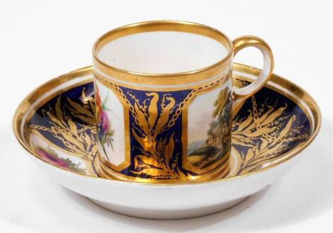 A 19thC Derby porcelain coffee can and saucer, c1800, puce marked pattern no. 653, flowers and landscape bands, painted by William Quakes Pegg, between Smith blue bands and gilt chain gilding, 9cm Dia.