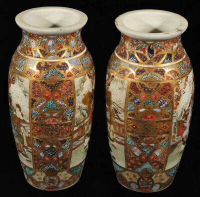 A pair of Meiji period Japanese pottery Satsuma vases, each of shouldered form, profusely decorated with panels of figures in an exterior setting, broken by a geometric pattern predominately in orange, blue and green with gilt highlights, unmarked, 21cm H - 4