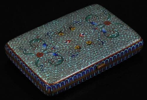 A 20thC Chinese cloisonné box, of oblong form with thumb mould handle, profusely decorated with flowers, on a turquoise and blue ground, with gilt highlights, 14cm W.