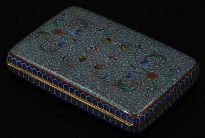 A 20thC Chinese cloisonné box, of oblong form with thumb mould handle, profusely decorated with flowers, on a turquoise and blue ground, with gilt highlights, 14cm W. - 2