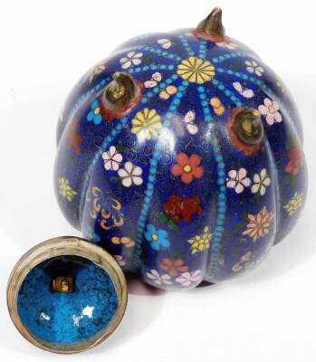 An early 20thC Chinese cloisonné jar and cover, of melon shape, with domed lid, profusely decorated with flowers predominately in red, pink and white on a blue and turquoise ground, on triple shaped feet, 12cm H. - 4