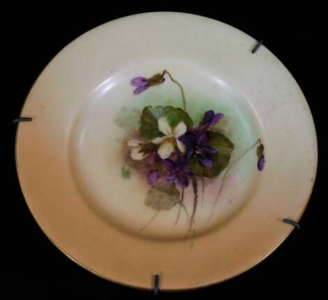 An early 20thC Royal Worcester porcelain saucer, handpainted with flowers, unsigned, 1905, 12cm Dia.