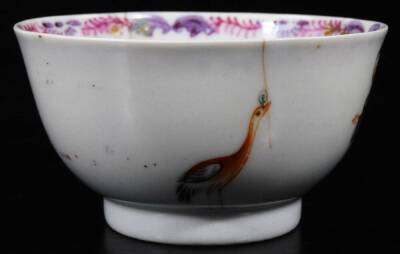 A Chinese Republic porcelain tea bowl and saucer, 13cm Dia. each polychrome decorated with figures and birds, predominately in pink, green and blue, unmarked. (AF) - 7