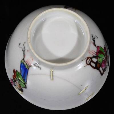 A Chinese Republic porcelain tea bowl and saucer, 13cm Dia. each polychrome decorated with figures and birds, predominately in pink, green and blue, unmarked. (AF) - 9