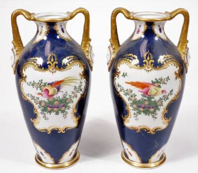 A pair of early 20thC Grainger & Co Worcester porcelain exotic bird pattern vases, each decorated with panels of birds and garlands, predominately in pink, yellow and green on blue grounds with gilt highlights, marked beneath, 23cm H. - 3