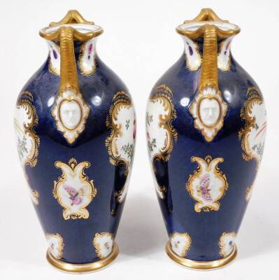 A pair of early 20thC Grainger & Co Worcester porcelain exotic bird pattern vases, each decorated with panels of birds and garlands, predominately in pink, yellow and green on blue grounds with gilt highlights, marked beneath, 23cm H. - 4