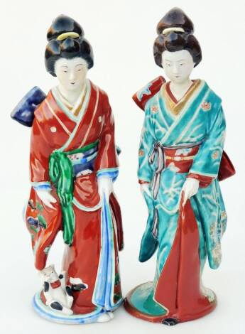 A Japanese pottery late Meiji figure, of a geisha in flowing robes florally decorated predominately in turquoise and brown, 17cm H, and another figure similarly decorated. (2)