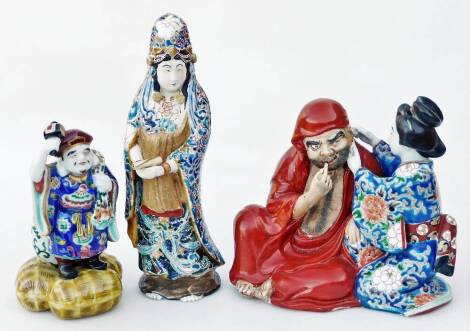 Three various early 20thC porcelain figures, comprising a standing Chinese lady holding scroll, polychrome decorated predominately in blue and green robes, 28cm H, a figure of a bearded gentleman and two seated figures in flowing robes, polychrome decorat