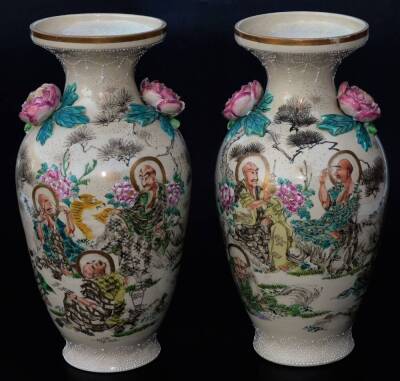 A pair of Japanese pottery Kyoto Meiji period vases, each with compressed trumpet stems and shouldered bodies, raised with a flowerhead and leaves, profusely decorated with figures in flowing robes, predominately in turquoise and yellow with gilt highligh - 3