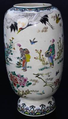 A Japanese Meiji period Kyoto type pottery vase, the shaped body decorated with crane, figures and flowers, predominately in orange, green and blue, with further insects beneath, on a circular domed foot, 30cm H. - 3