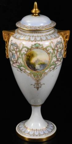 An early 20thC Royal Worcester vase and cover, 1920, of shouldered form, with moulded gilt handles, decorated with a repeat geometric and handpainted scene, indistinctly signed, on an inverted stem and circular foot, numbered 2713, 30cm H.