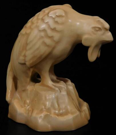 An early 20thC Royal Worcester blush ivory eagle candle snuffer ornament, 1916, printed marks beneath, 9cm H.