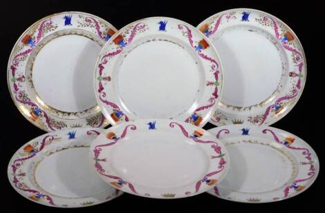 A set of six Chinese export porcelain armorial plates, of circular form, set with a gilt coloured crown and dragon motif, with a polychrome floral scroll surround, predominately in pink, blue and orange with gilt highlights, 25cm Dia. (6)