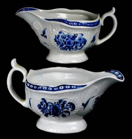 A pair of 18thC Worcester porcelain sauce boats, c1780, painted with the Floral pattern, 16cm W.