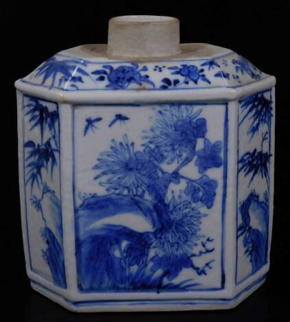 A 19thC Chinese Qing period blue and white porcelain tea caddy, of hexagonal form decorated with panels of flowers, with four character mark beneath, 15cm H.